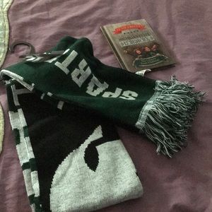 Michigan State University winter scarf and trivia book